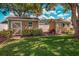 Two sheds with coordinated paint and trim offering practical outdoor storage in a neatly landscaped yard at 10611 131St St, Largo, FL 33774