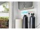 Water treatment system located in a closet outside near the lawn at 10611 131St St, Largo, FL 33774
