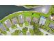 An aerial view showcases the neighborhood, including the lakefront backyard views and the community pool at 10621 Ribbon Fern Way Way, Land O Lakes, FL 34638