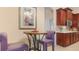 Eat-in kitchen with modern counters and wooden cabinets at 10621 Ribbon Fern Way Way, Land O Lakes, FL 34638