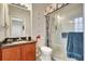 Bathroom featuring a granite vanity and glass enclosed shower at 10734 Banfield Dr, Riverview, FL 33579