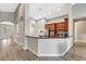Bright kitchen with black granite countertops and wood cabinets at 10734 Banfield Dr, Riverview, FL 33579
