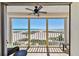 Inviting balcony featuring seating, tile flooring, and breathtaking ocean views at 11000 Gulf Blvd # 703, Treasure Island, FL 33706