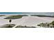 Aerial view of the pristine white sand beach, perfect for relaxation and recreation at 11000 Gulf Blvd # 703, Treasure Island, FL 33706