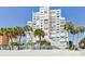 Beautiful condo building by the beach with lush landscaping and direct access to the white sand at 11000 Gulf Blvd # 703, Treasure Island, FL 33706