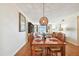 Bright dining room flows into the living area, offering scenic views and comfortable seating at 11000 Gulf Blvd # 703, Treasure Island, FL 33706