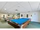 This game room features a ping pong table and a billiard table for entertainment and recreation at 11000 Gulf Blvd # 703, Treasure Island, FL 33706