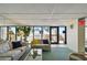Comfortable lobby area with plenty of seating, natural light, and views of the outdoors at 11000 Gulf Blvd # 703, Treasure Island, FL 33706