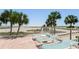 Relax on the patio with lounge chairs offering beautiful views of the beach and ocean at 11000 Gulf Blvd # 703, Treasure Island, FL 33706