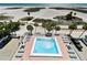 Relax and unwind by the community's sparkling pool with plenty of lounge chairs at 11000 Gulf Blvd # 703, Treasure Island, FL 33706