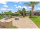 Backyard fire pit area with decorative landscaping at 11603 Heron Watch Pl, Riverview, FL 33569
