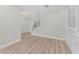 Living room showcasing built in shelves and staircase at 11603 Heron Watch Pl, Riverview, FL 33569