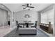 Beautiful dining area with high ceilings, ceiling fan, modern decor, and stylish furniture at 12729 Flatwood Creek Dr, Gibsonton, FL 33534