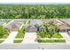 A beautiful single-Gathering home with a well-manicured lawn and attractive landscaping at 12729 Flatwood Creek Dr, Gibsonton, FL 33534