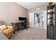 Well-lit home office with double doors, a comfortable leather chair, and modern desk setup at 12729 Flatwood Creek Dr, Gibsonton, FL 33534