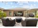 An expansive outdoor patio with paver flooring and outdoor seating, perfect for entertaining and relaxation at 12729 Flatwood Creek Dr, Gibsonton, FL 33534