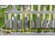 An aerial view displays a home with solar panels in a neighborhood with well-maintained landscaping at 13016 Boggy Creek Dr, Riverview, FL 33579