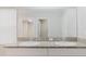 Bathroom features double sinks with granite countertop at 13016 Boggy Creek Dr, Riverview, FL 33579