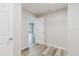 Spacious closet area with wooden style vinyl floors at 13016 Boggy Creek Dr, Riverview, FL 33579