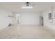 Spacious garage with ample room for parking and storage, alongside convenient interior access to the home at 13016 Boggy Creek Dr, Riverview, FL 33579