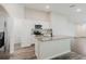 Modern kitchen featuring stainless steel appliances, granite countertops, and an island with sink at 13016 Boggy Creek Dr, Riverview, FL 33579