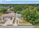 Aerial view of a single Gathering home with a large tree in the front yard at 1419 30Th N Ave, St Petersburg, FL 33704