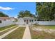 This single Gathering home features a sidewalk and a large front yard at 1419 30Th N Ave, St Petersburg, FL 33704
