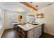 Modern kitchen showcasing marble countertops, stylish fixtures, and seamless dining area access at 1419 30Th N Ave, St Petersburg, FL 33704