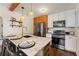 Bright kitchen with marble countertops, stainless steel appliances, and bar stool seating at 1419 30Th N Ave, St Petersburg, FL 33704