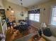 Bright dining area featuring a chandelier and natural light from large windows at 16134 Ravendale Dr, Tampa, FL 33618