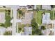 Aerial view of a single Gathering home with well-maintained landscaping and a backyard at 162 Lagoon Way, Palm Harbor, FL 34684