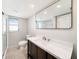 Remodeled bathroom with sleek vanity, updated fixtures, and a glass-enclosed shower at 162 Lagoon Way, Palm Harbor, FL 34684