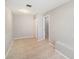 Bright bonus room with tile flooring, closet and views of another room at 162 Lagoon Way, Palm Harbor, FL 34684