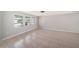 Light and airy living room featuring neutral paint, recessed lighting and large tile flooring at 162 Lagoon Way, Palm Harbor, FL 34684
