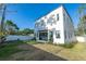 Backyard with a view of the home's exterior at 1625 55Th S St, Gulfport, FL 33707
