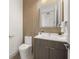 Modern powder room boasts stylish wood accent wall, floating vanity and sleek fixtures at 1625 55Th S St, Gulfport, FL 33707