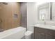 Modern bathroom showcasing a tub and a shower at 1625 55Th S St, Gulfport, FL 33707