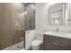 Modern bathroom featuring a walk-in shower with floor-to-ceiling tile at 1625 55Th S St, Gulfport, FL 33707