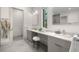 Bright main bathroom features dual sinks, a vanity, and stylish fixtures at 1625 55Th S St, Gulfport, FL 33707
