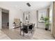 Bright dining room with modern light fixture and neutral tones at 1625 55Th S St, Gulfport, FL 33707