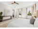 Bright main bedroom features a sitting area, large windows, and access to the bathroom at 1625 55Th S St, Gulfport, FL 33707