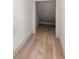 Small storage nook with grey floors at 1625 55Th S St, Gulfport, FL 33707