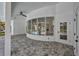 Spacious patio featuring tile flooring, views of the pool and elegant architecture at 16317 Colwood Dr, Odessa, FL 33556