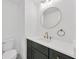 Chic powder room featuring modern vanity, gold fixtures, and a clean aesthetic for a stylish touch at 16317 Colwood Dr, Odessa, FL 33556