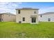 Large backyard featuring a well-maintained lawn, perfect for outdoor activities and relaxation at 1680 Hazy Sea Dr, Plant City, FL 33565