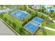 Aerial view showcasing sports courts including basketball and pickleball near community pool at 1680 Hazy Sea Dr, Plant City, FL 33565