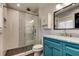 Stylish bathroom featuring a tiled glass shower, vanity, and modern fixtures at 1858 Michigan Ne Ave, St Petersburg, FL 33703