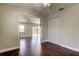 Bedroom view to the outdoor deck, ceiling fan, and white closet at 1858 Michigan Ne Ave, St Petersburg, FL 33703