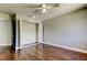 Bedroom showing hardwood floors, recessed lighting, and a closet with folding doors at 1858 Michigan Ne Ave, St Petersburg, FL 33703