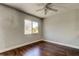Bedroom featuring wood flooring and a window for natural light at 1858 Michigan Ne Ave, St Petersburg, FL 33703